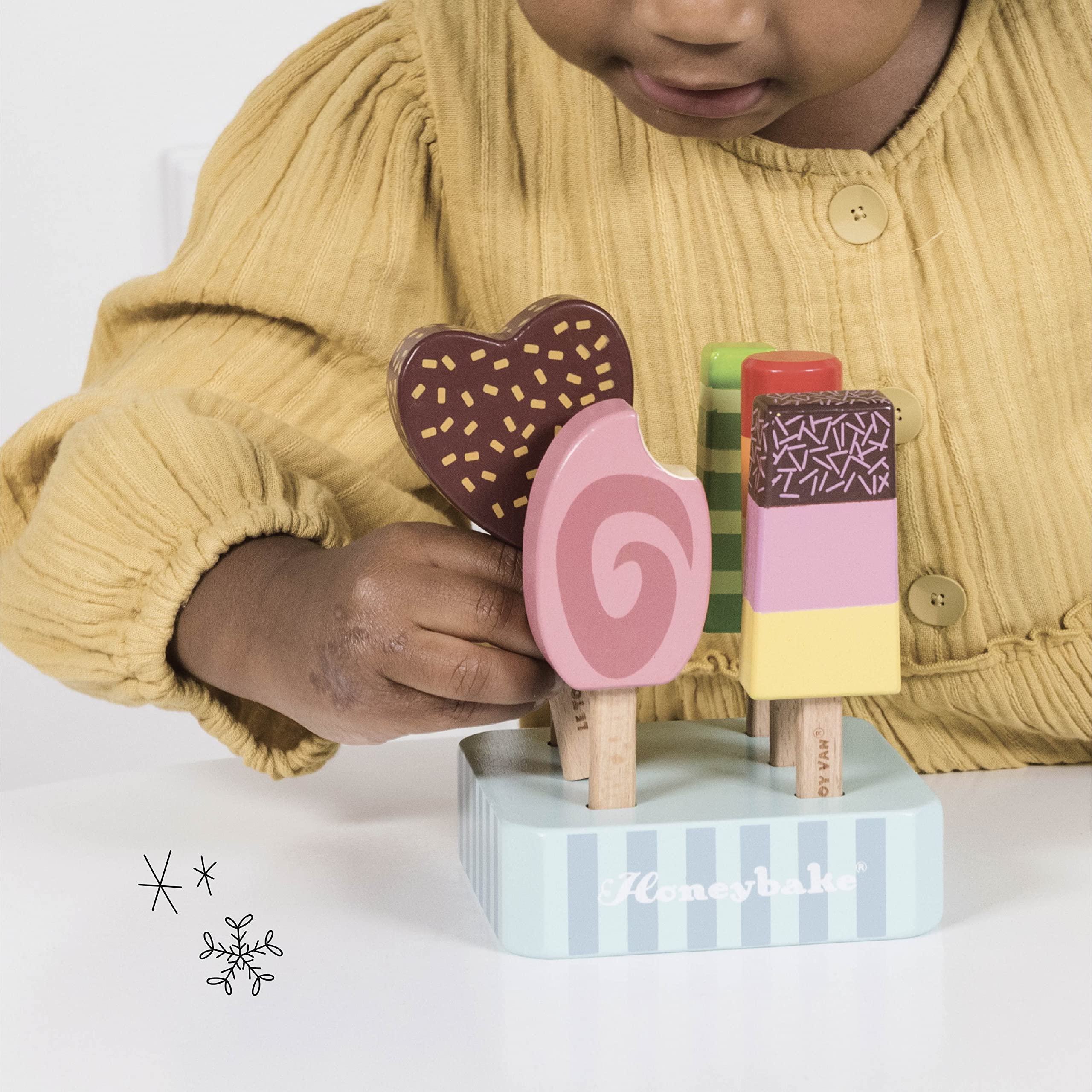 Sustainably crafted rubberwood toys from Le Toy Van Honeybake built to withstand lively play.