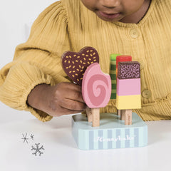 Sustainably crafted rubberwood toys from Le Toy Van Honeybake built to withstand lively play.
