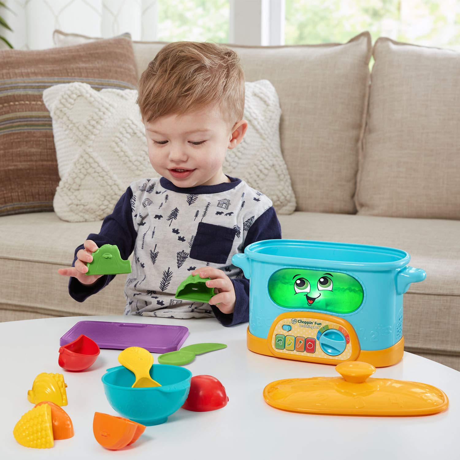 LeapFrog corn on the cob scene supports healthy food play.