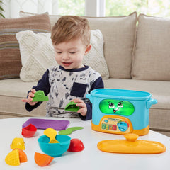 LeapFrog corn on the cob scene supports healthy food play.