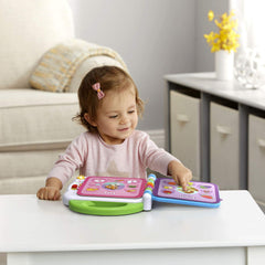 LeapFrog Learning Friends 100 Words Book language switch enables bilingual words and songs.