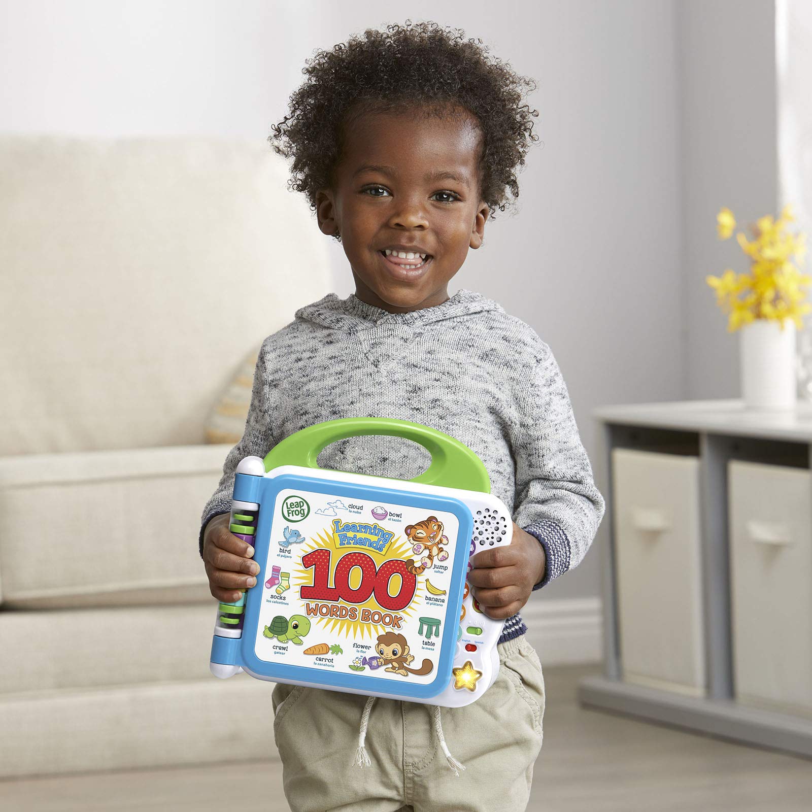 LeapFrog Learning Friends 100 Words Book light-up star button delivers two songs.