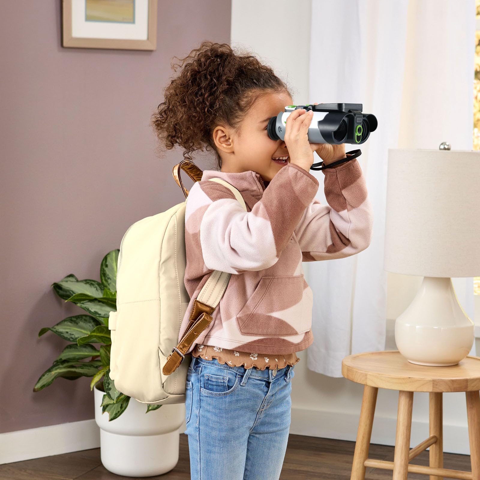 Backyard exploration with LeapFrog binoculars encourages curious observation