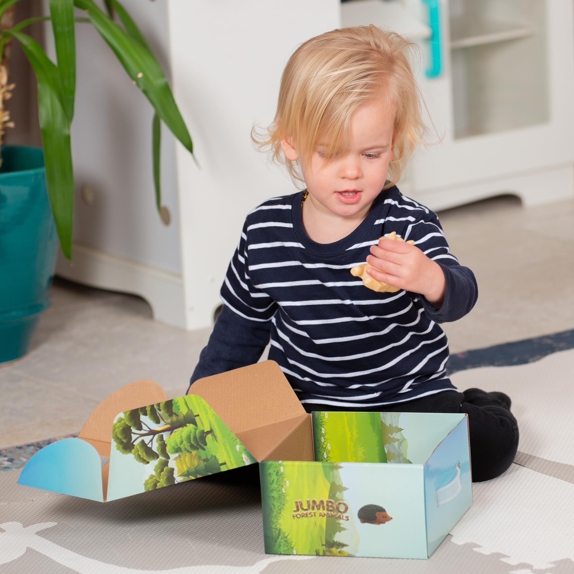 Learning Minds carry box for easy storage after woodland playtime.