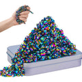 LECTRUS rainbow magnetic balls on desk for focused, tactile play and stress relief.