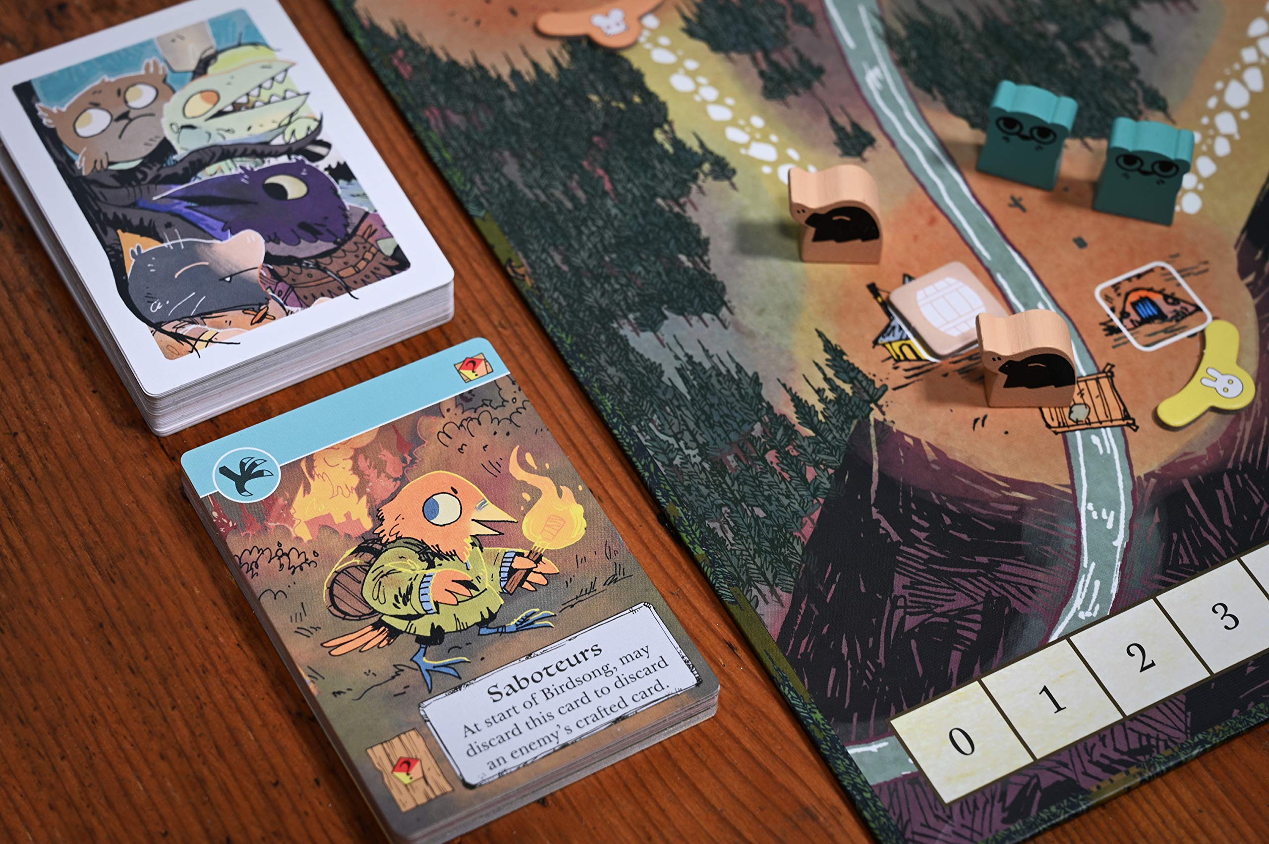 Leder Games Root Exiles and Partisans deck components arranged for quick setup.