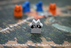 Game-night setup with Root components ready for 2–4 players.
