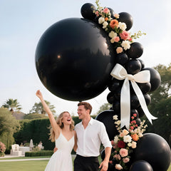 LEEZZIZZ wedding or anniversary decor with oversized balloons for festive ambiance.