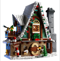 LEGO 10339 Santa's Post Office Santa study with fireplace sparks imaginative storytelling.