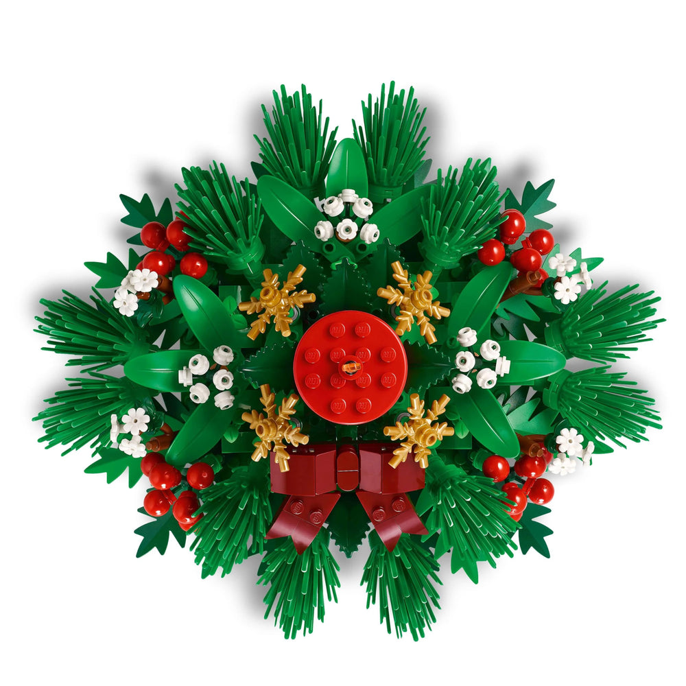 LEGO 40743 family-building moment during holidays around a festive centerpiece