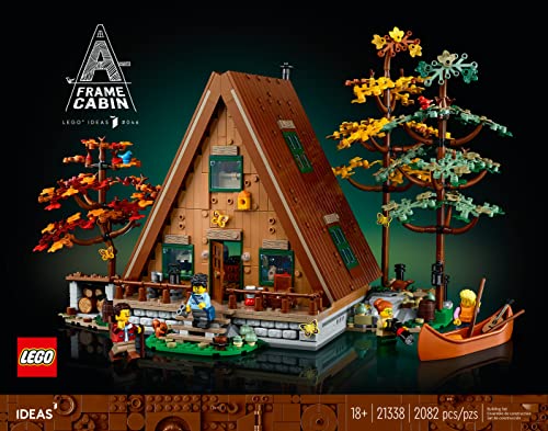LEGO Ideas A-Frame Cabin interior bedroom view highlights cozy retreat and detailed interiors.