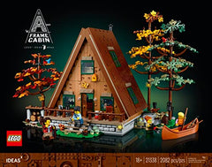 LEGO Ideas A-Frame Cabin interior bedroom view highlights cozy retreat and detailed interiors.