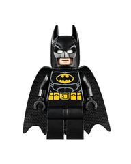 LEGO Batman minifigure in dynamic action pose for scene setup.