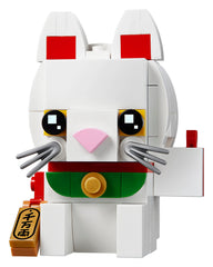 Close-up of LEGO BrickHeadz Lucky Cat 40436 movable paw for poseable fun.