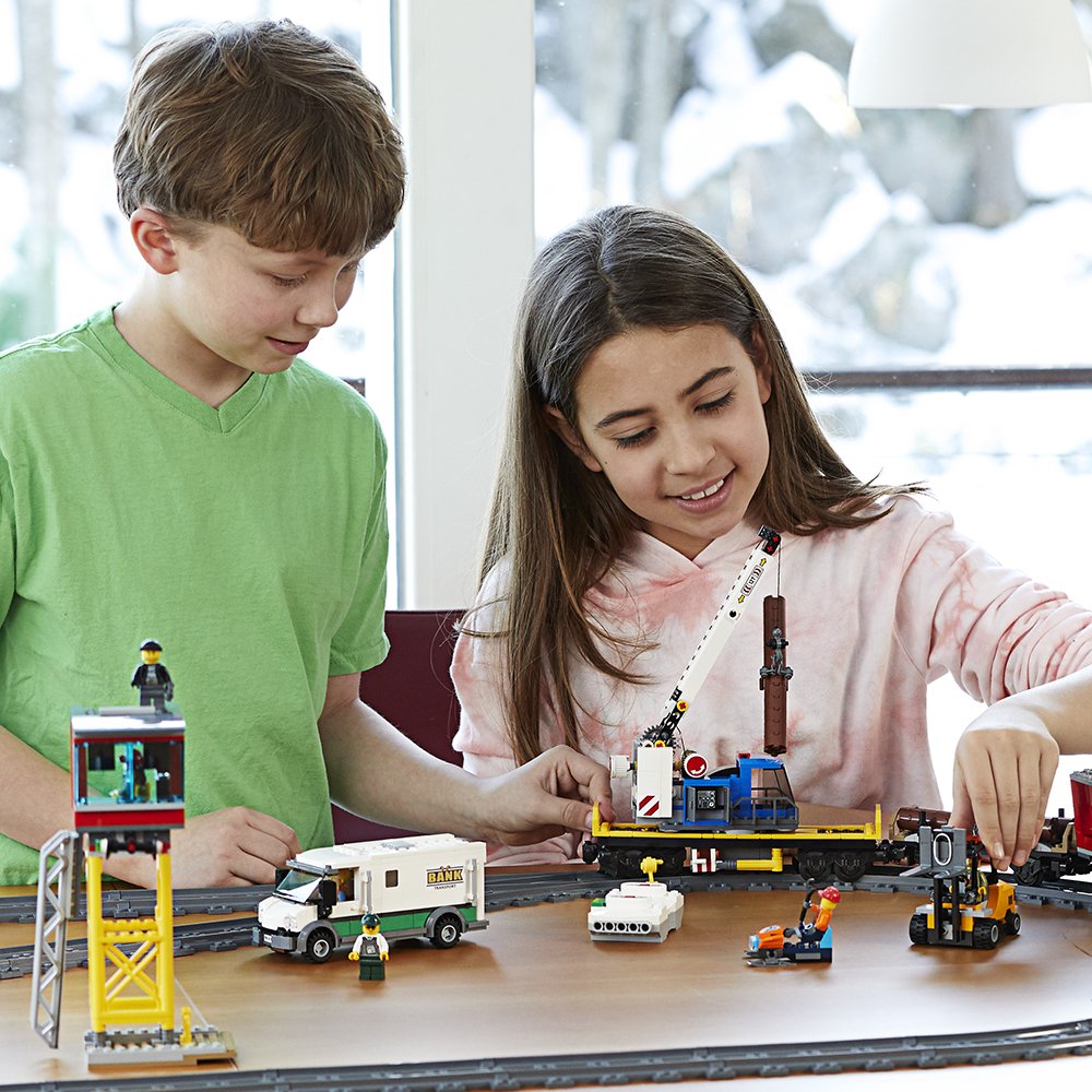 LEGO City Cargo Train track system with control center enables coordinated journeys.