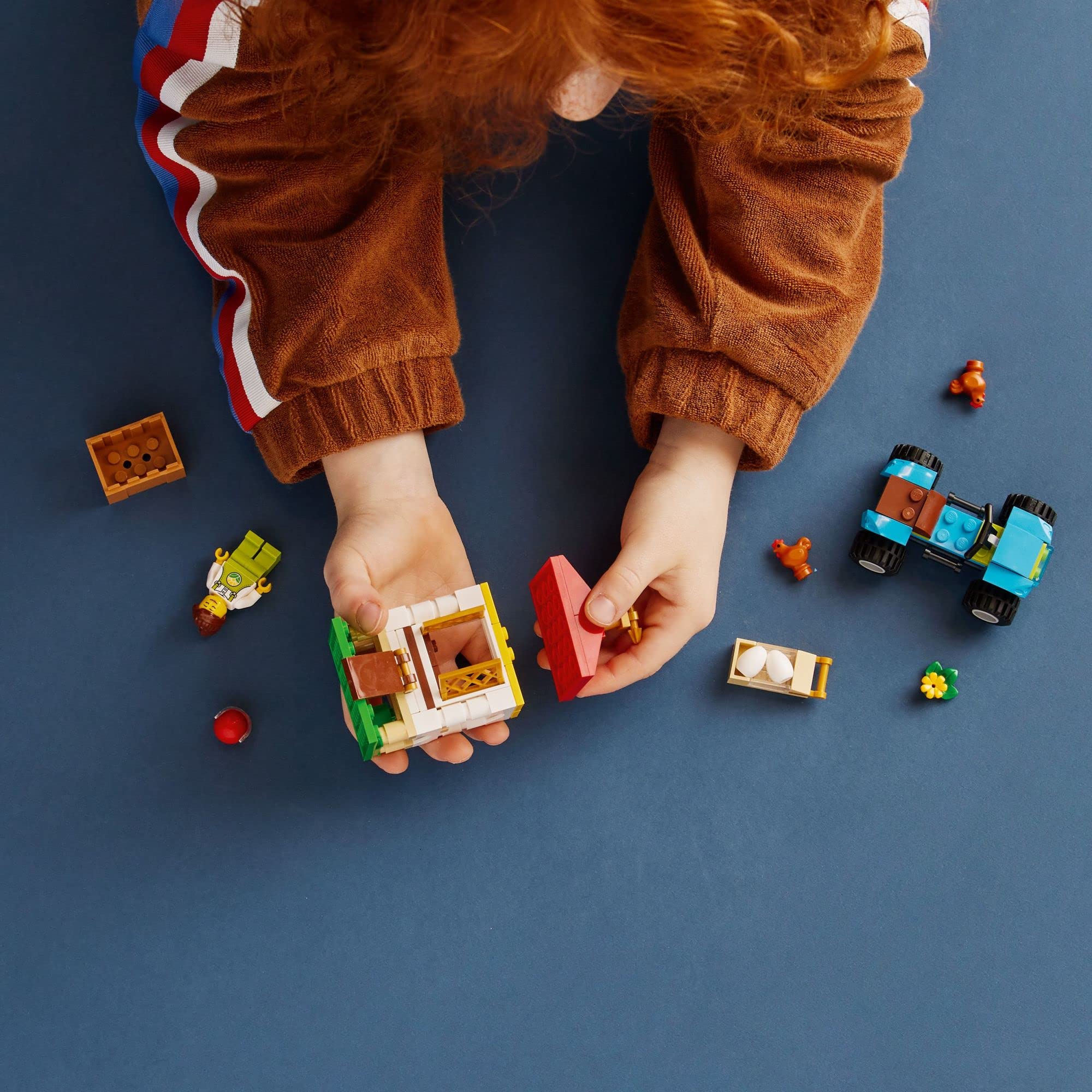 LEGO City farmer minifigure included for farm storytelling.