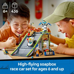 LEGO City race car ramp peak with two soapbox cars for action-filled launches.