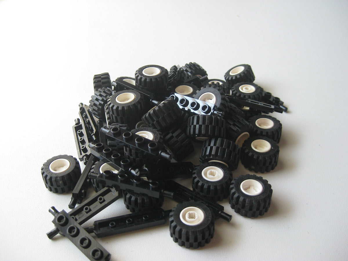 LEGO City wheel assembly with 20 black axles for sturdy builds and smooth rotation.