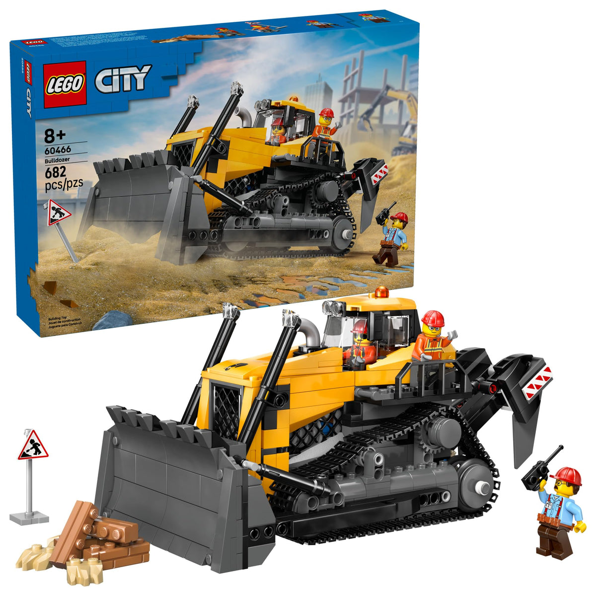 LEGO City yellow bulldozer front pusher blade clearing debris on a pretend site