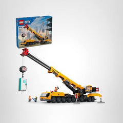 LEGO City yellow mobile construction crane in action on a pretend construction site