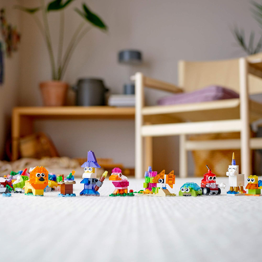 LEGO Classic transparent bricks wizard with potions desk and coral fish scene evokes imaginative storytelling.