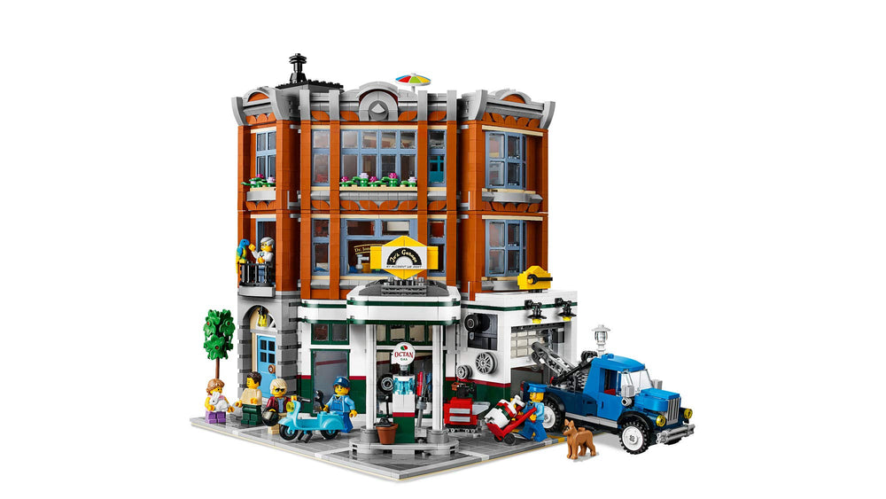 LEGO Creator Expert Corner Garage tow truck and scooter display.