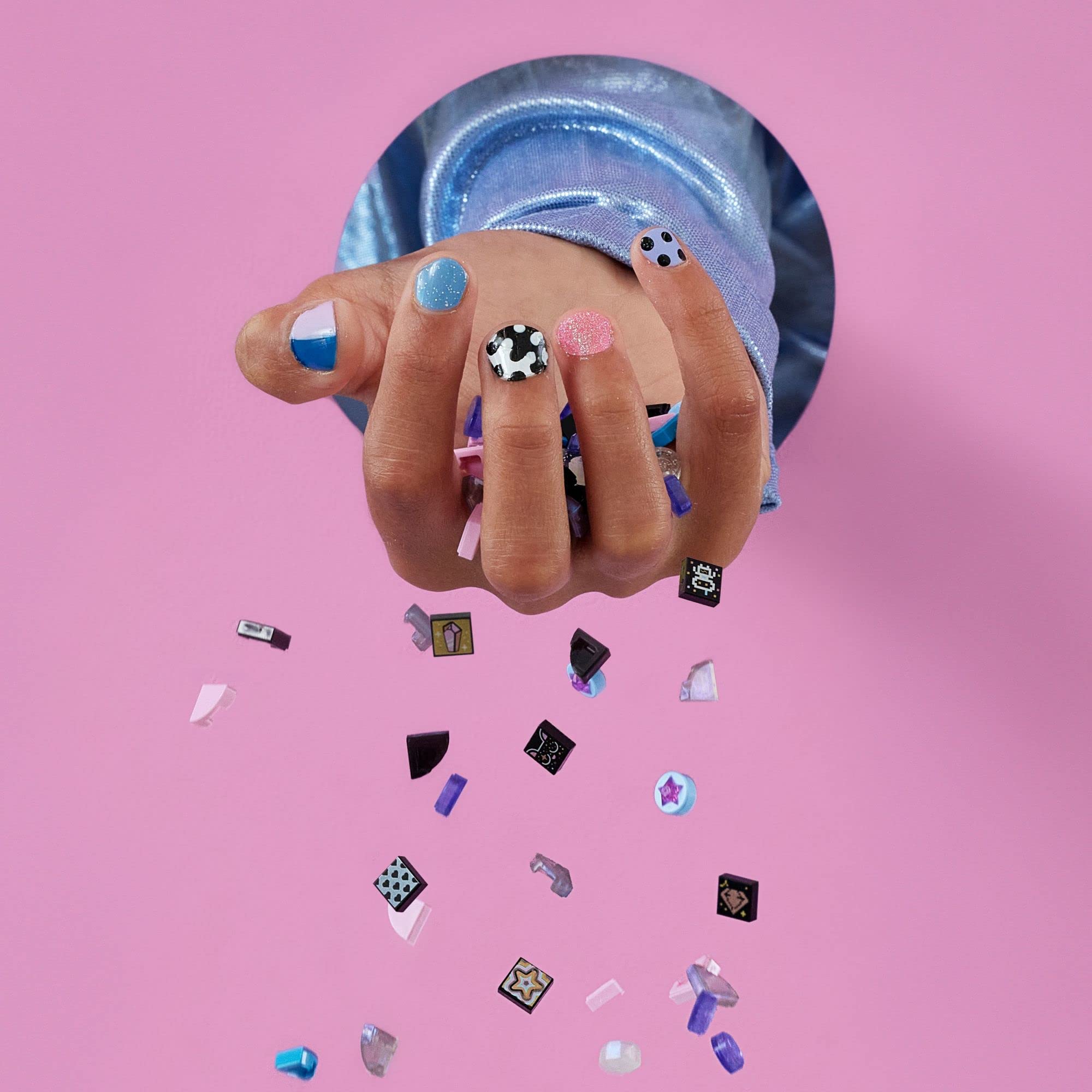 Graphic DOTS tiles featuring music, love, animals, and space designs
