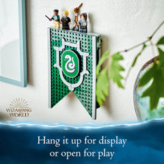 Draco Malfoy minifigure included with the Slytherin banner
