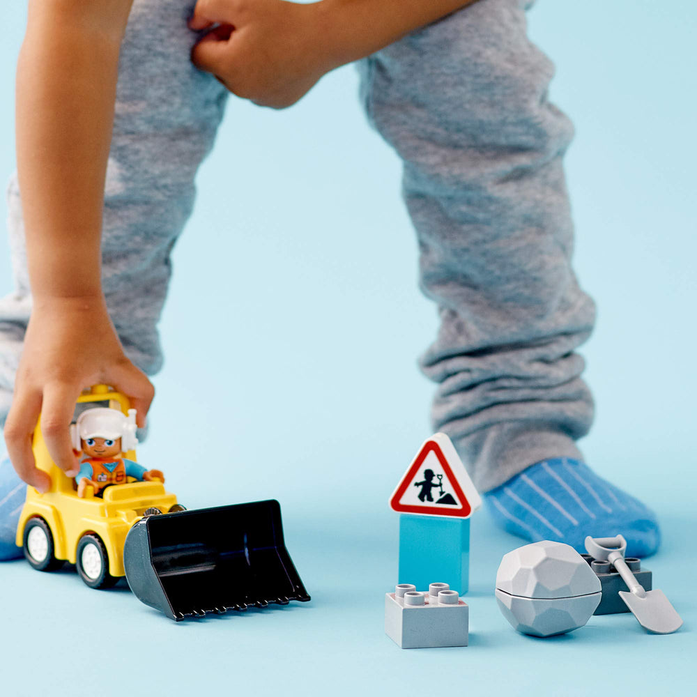 LEGO DUPLO bulldozer set inspires collaborative play with parent or sibling.