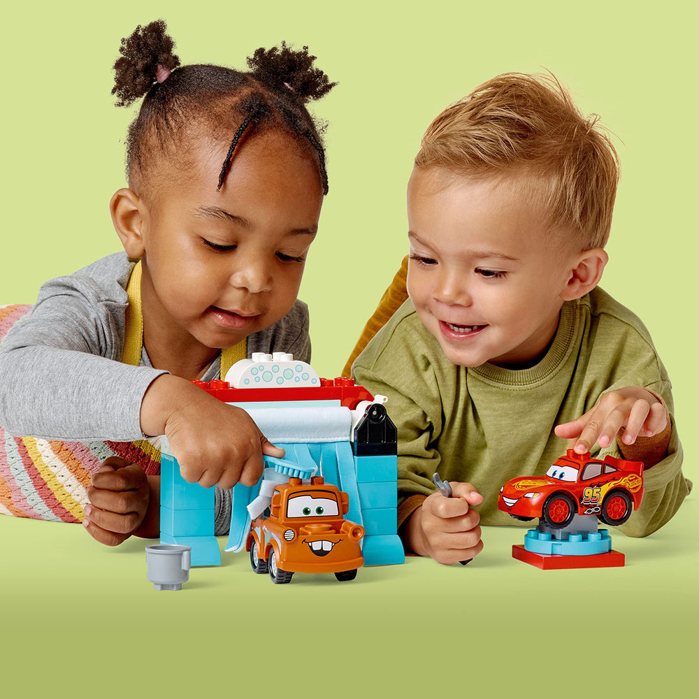 LEGO DUPLO car wash arm moves for interactive washing play.