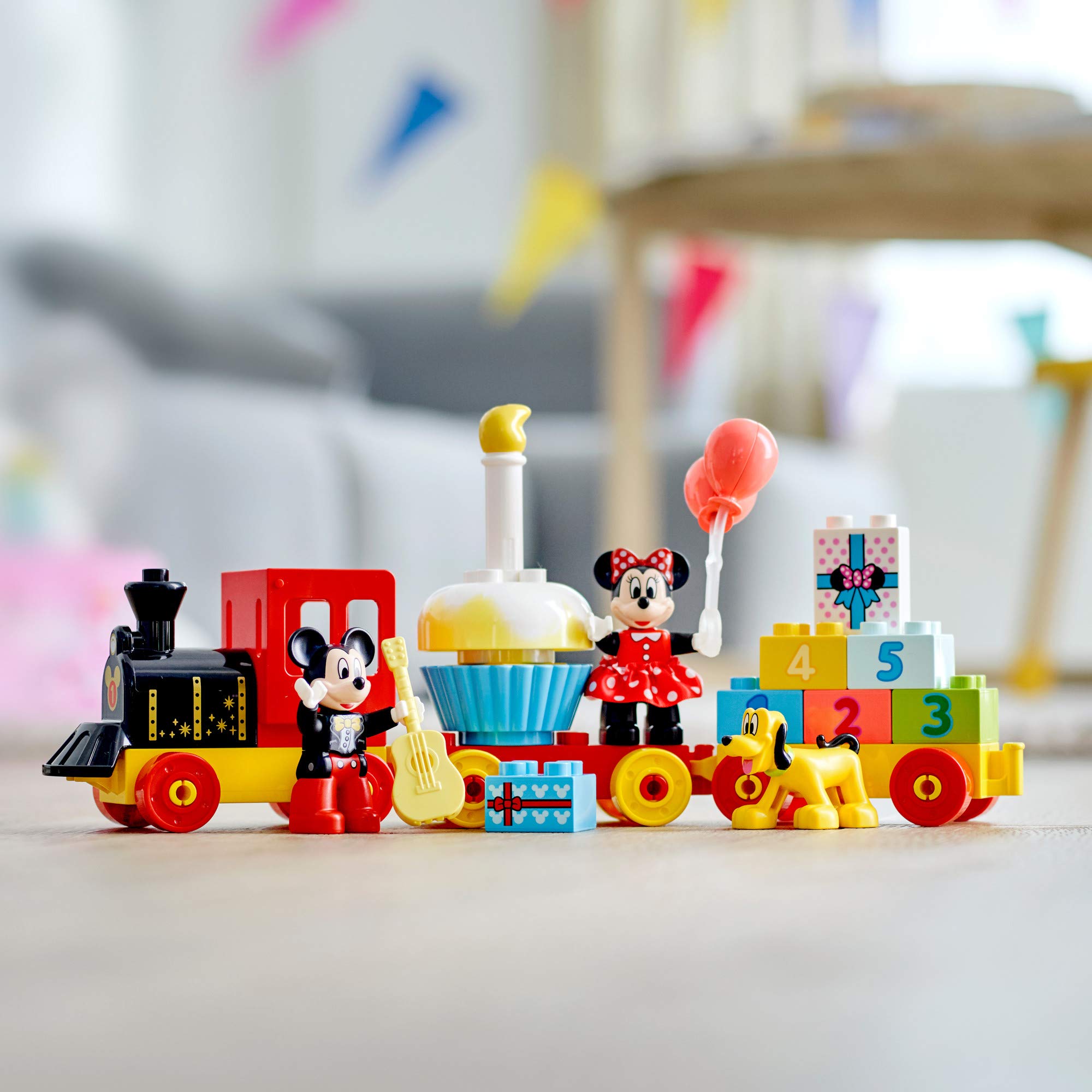 Imaginative play scene shown with the LEGO DUPLO Disney train set.