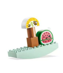 Lemon piece adds bright color focus for early recognition during shop play.