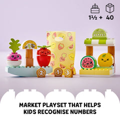 LEGO Duplo Organic Market scales help toddlers learn balance through stacking.