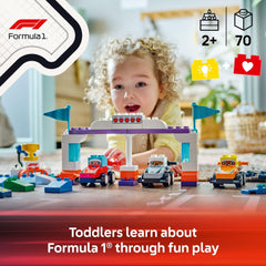 LEGO DUPLO Town F1 driver bricks encourage color recognition and pretend pit crew play.
