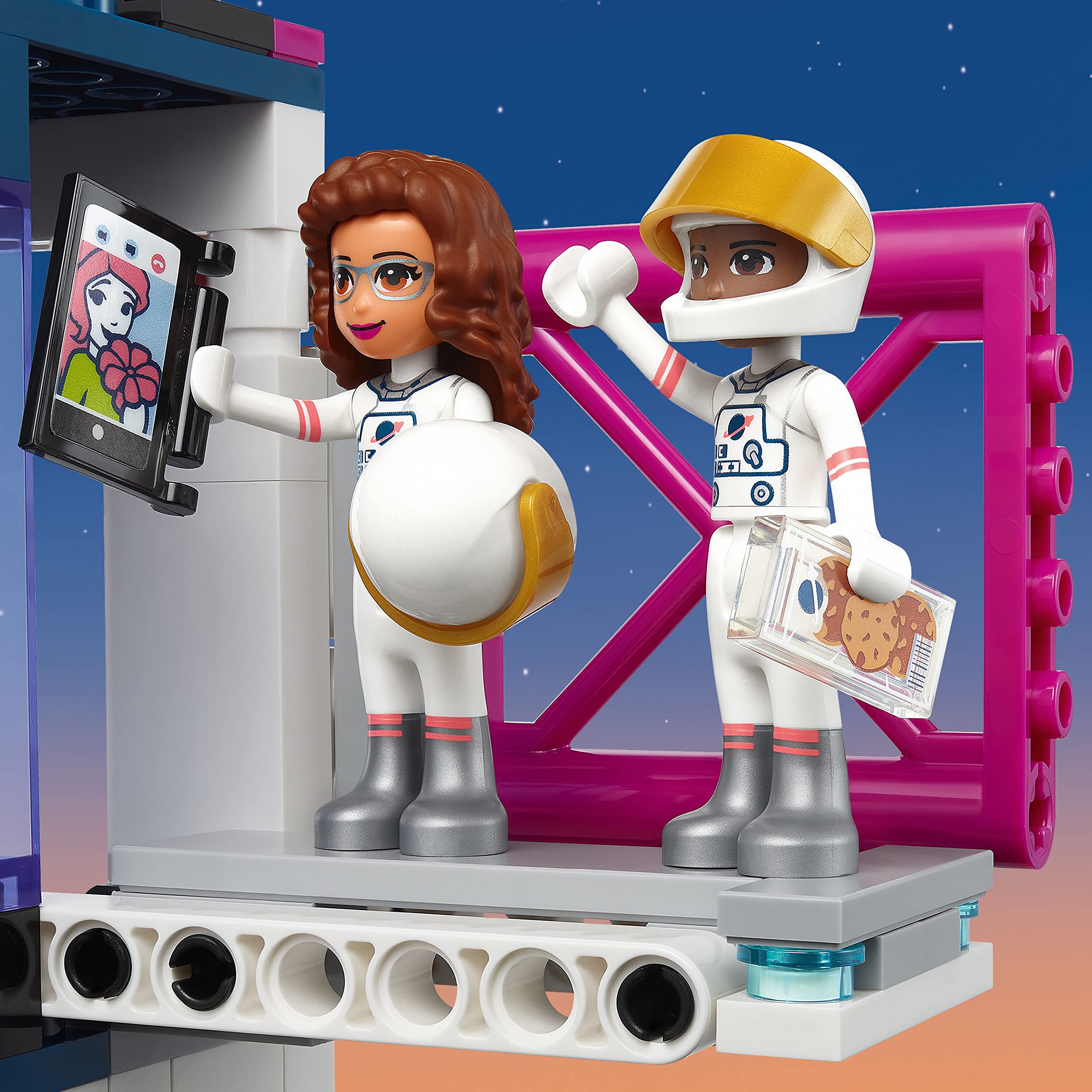 LEGO Friends Canadarm with astronauts demonstrates docking practice and precision play.
