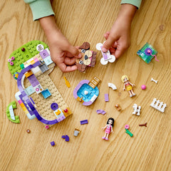 LEGO Friends Doggy Day Care cash register and snacks fuel pretend shop interactions.
