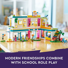 Classroom detail image highlights Aliya and Olly for role-play.