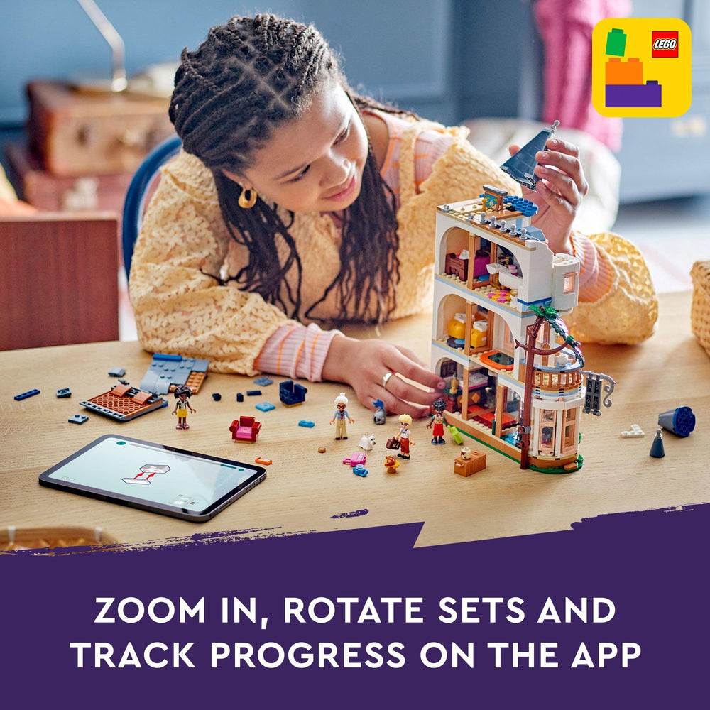 LEGO Friends hotel accessories and suitcases enrich busy breakfast and travel setups.