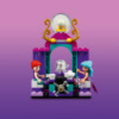 LEGO Friends Magical Caravan 41688 fortune-teller tent with spinning crystal ball for playful predictions.