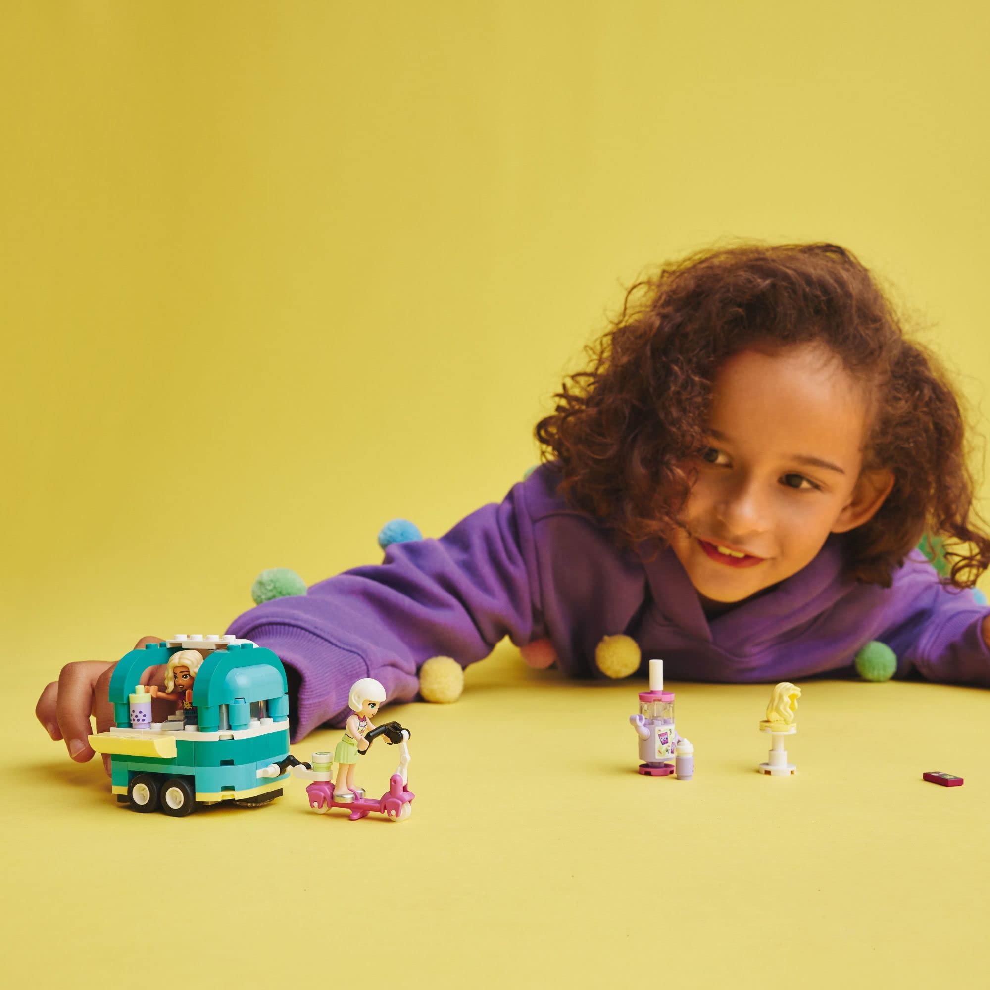 LEGO Friends Bubble Tea Shop scooter attached enables on-the-go pretend serving.