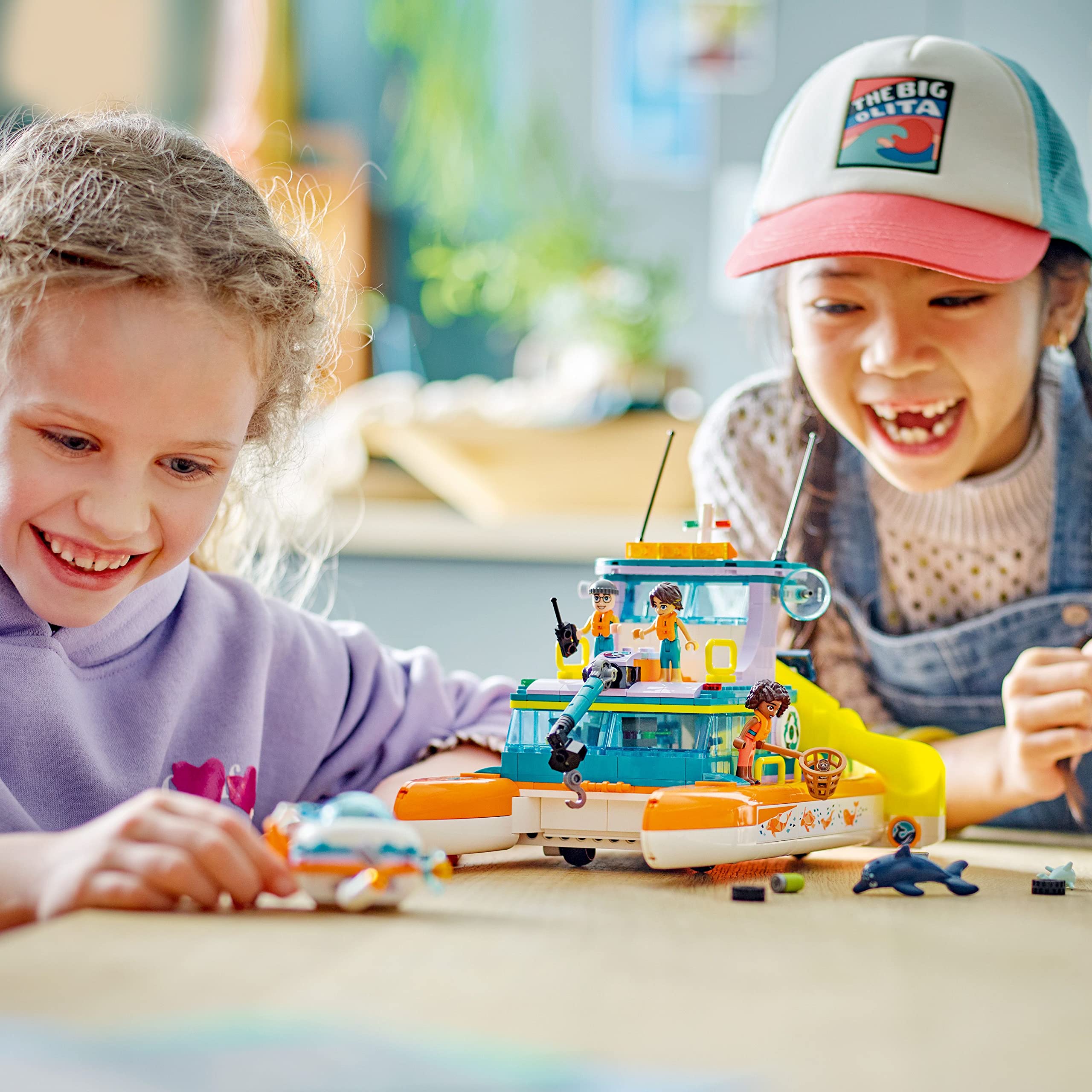 LEGO Friends Sea Rescue Boat 41734 Aliya and Nova mini-dolls featured.