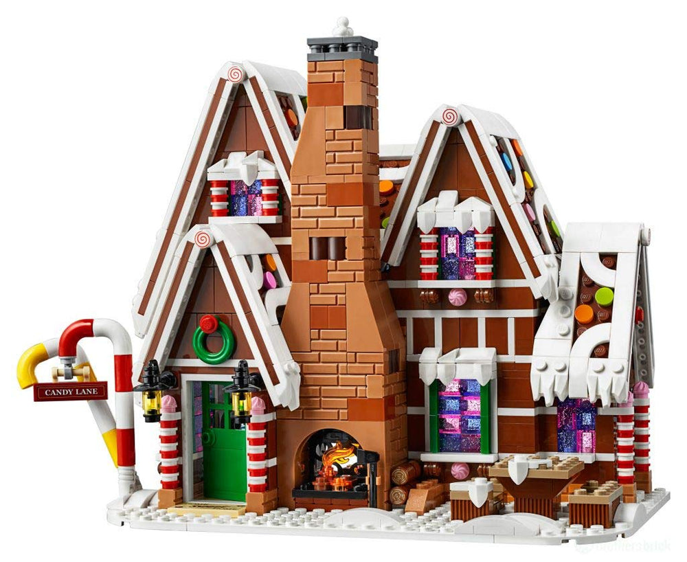 LEGO Gingerbread House fireplace glow enhances cozy display when fully built.
