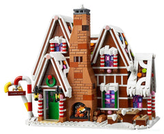 LEGO Gingerbread House fireplace glow enhances cozy display when fully built.