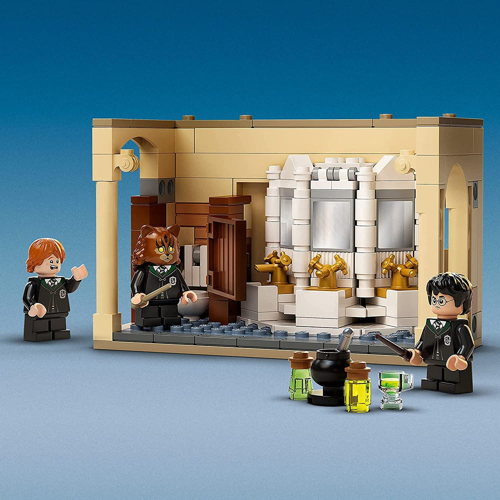 LEGO Harry Potter minifigs Harry Hermione Ron ready for magical brewing adventures.