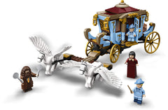 LEGO two-floor living area with beds and dining setup supports tea-time storytelling.