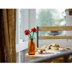 LEGO Iconic Rose 40460 displayed in a vase for elegant home decor.