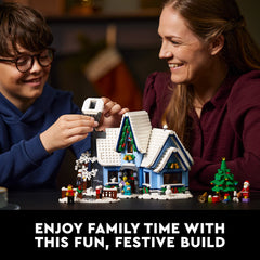 LEGO Icons Santa’s Visit 10293 cozy fireplace scene with stockings for family time.