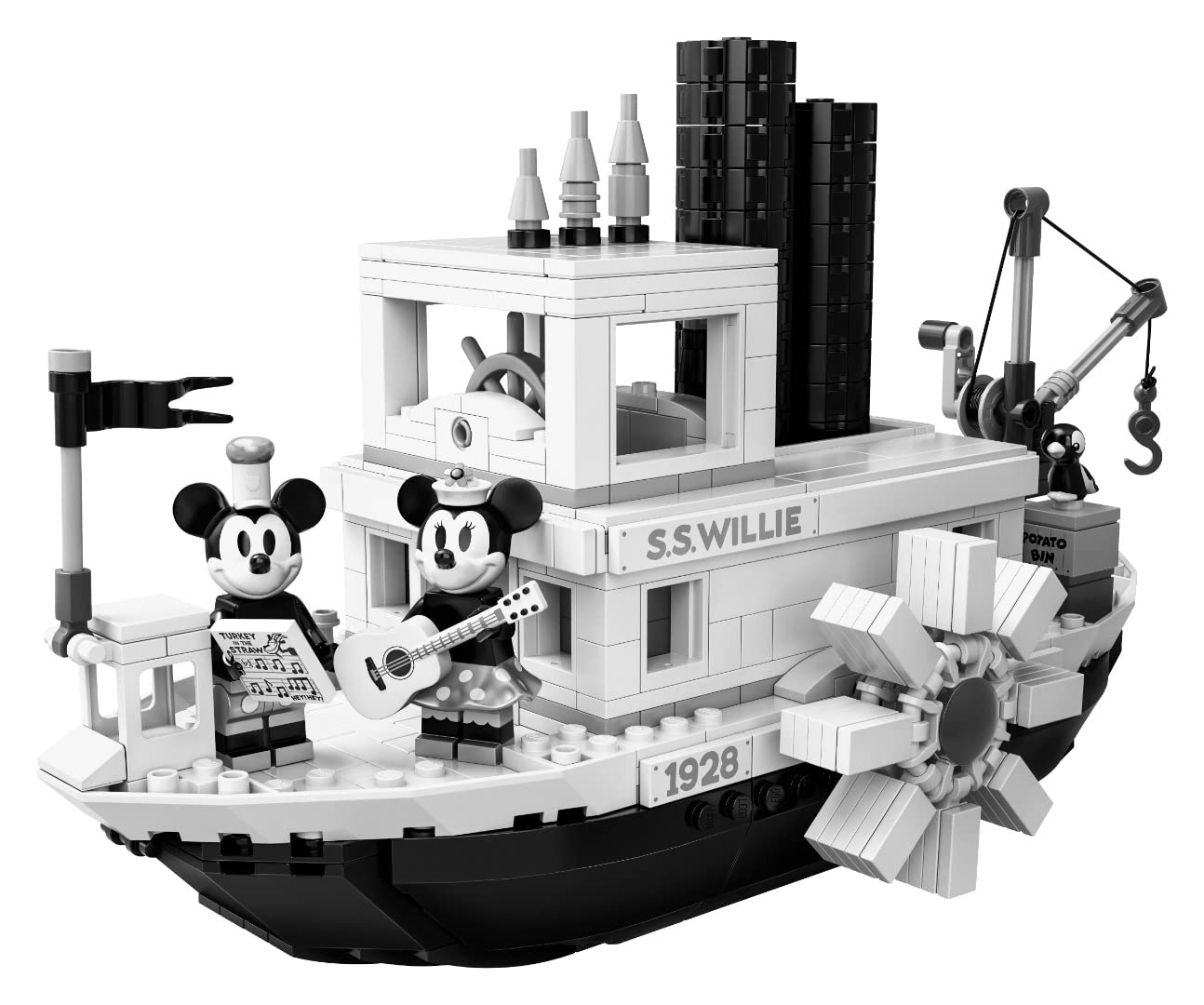Deck details showing ship's wheel, life buoy, and bell on Steamboat Willie