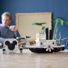 Steamboat Willie paddle wheels rotate when pushed for motion play