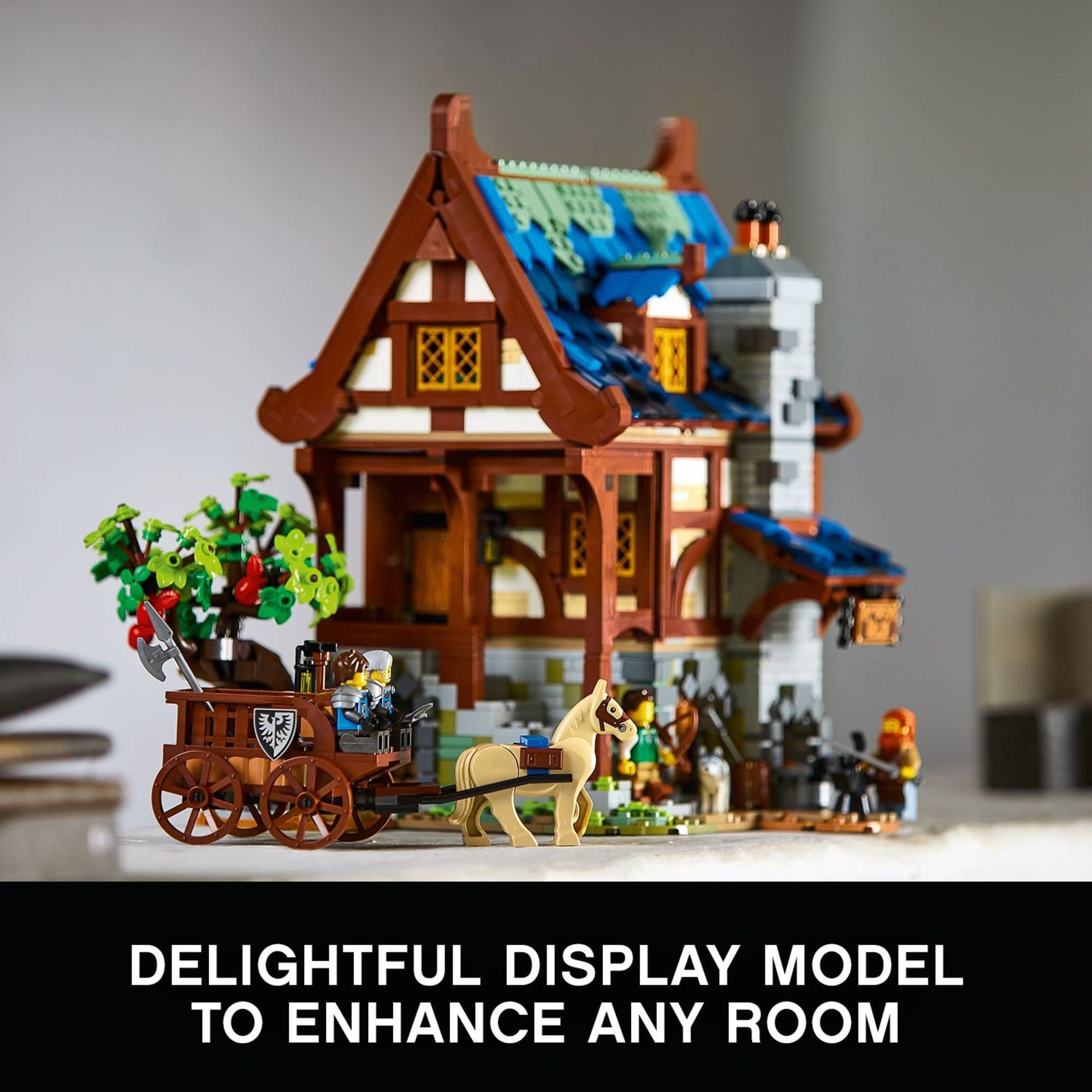 LEGO Ideas Medieval Blacksmith 21325 roof-off top levels, easy viewing of furnished rooms.